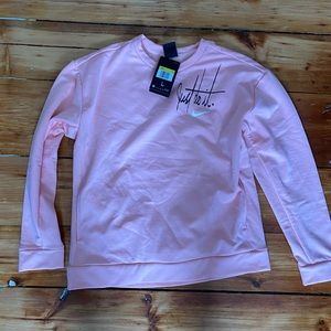 Pink Nike sweatshirt